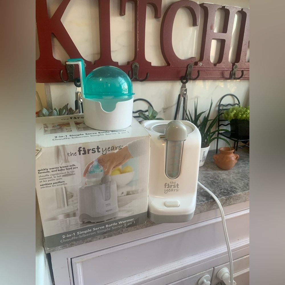 The First Years 2-In-1 Simple Serve Bottle Warmer and pacifier sterilizer